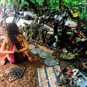 Kitty's photo of me in her sacred art garden. 